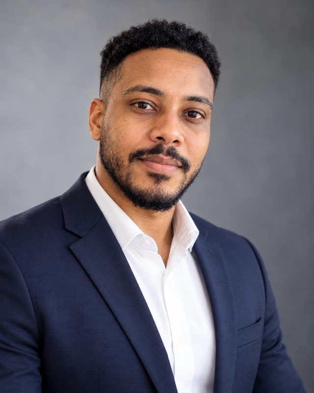AI professional headshot of the same man